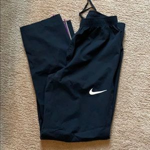 Black Nike track pants